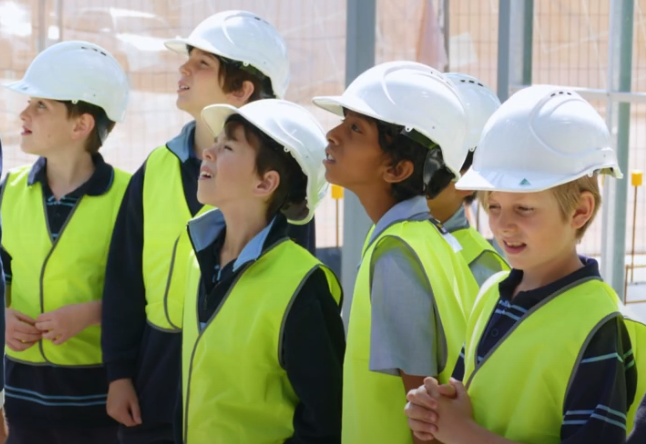 Students participated in a special "Hard Hat Walk Through" of the building site. This was an incredible opportunity to get a sneak peek inside the building before it is complete.